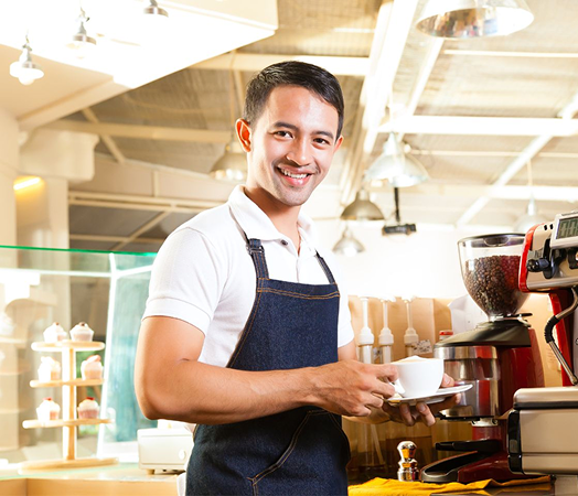 Barista making coffee